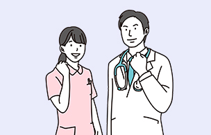 ガッツポーズする医師